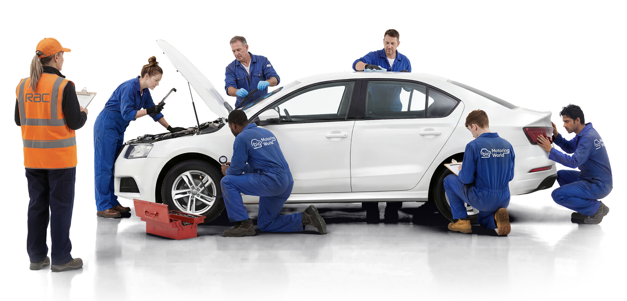 Big Motoring World technicians inspecting a car, observed by an RAC inspector
